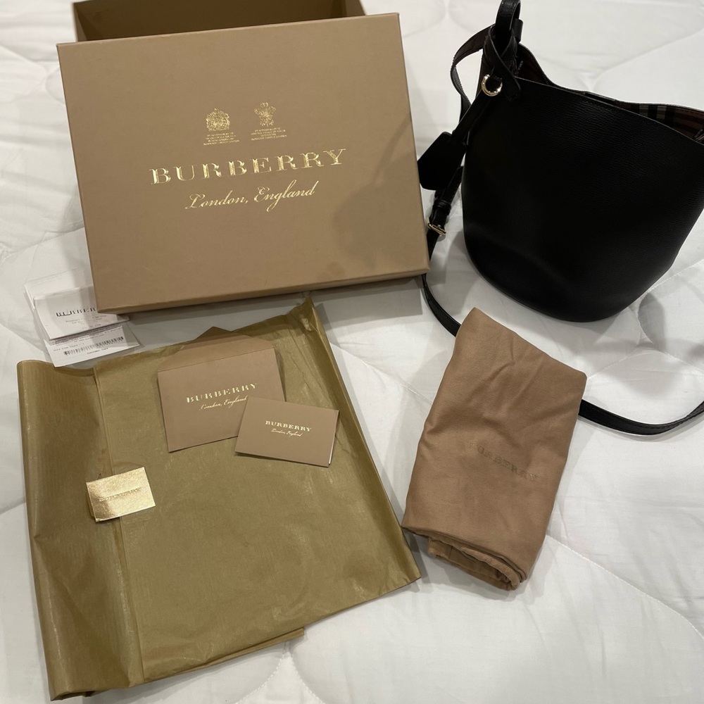 EUC Burberry bucket crossbody with dust bag and original tissue and box. Black
